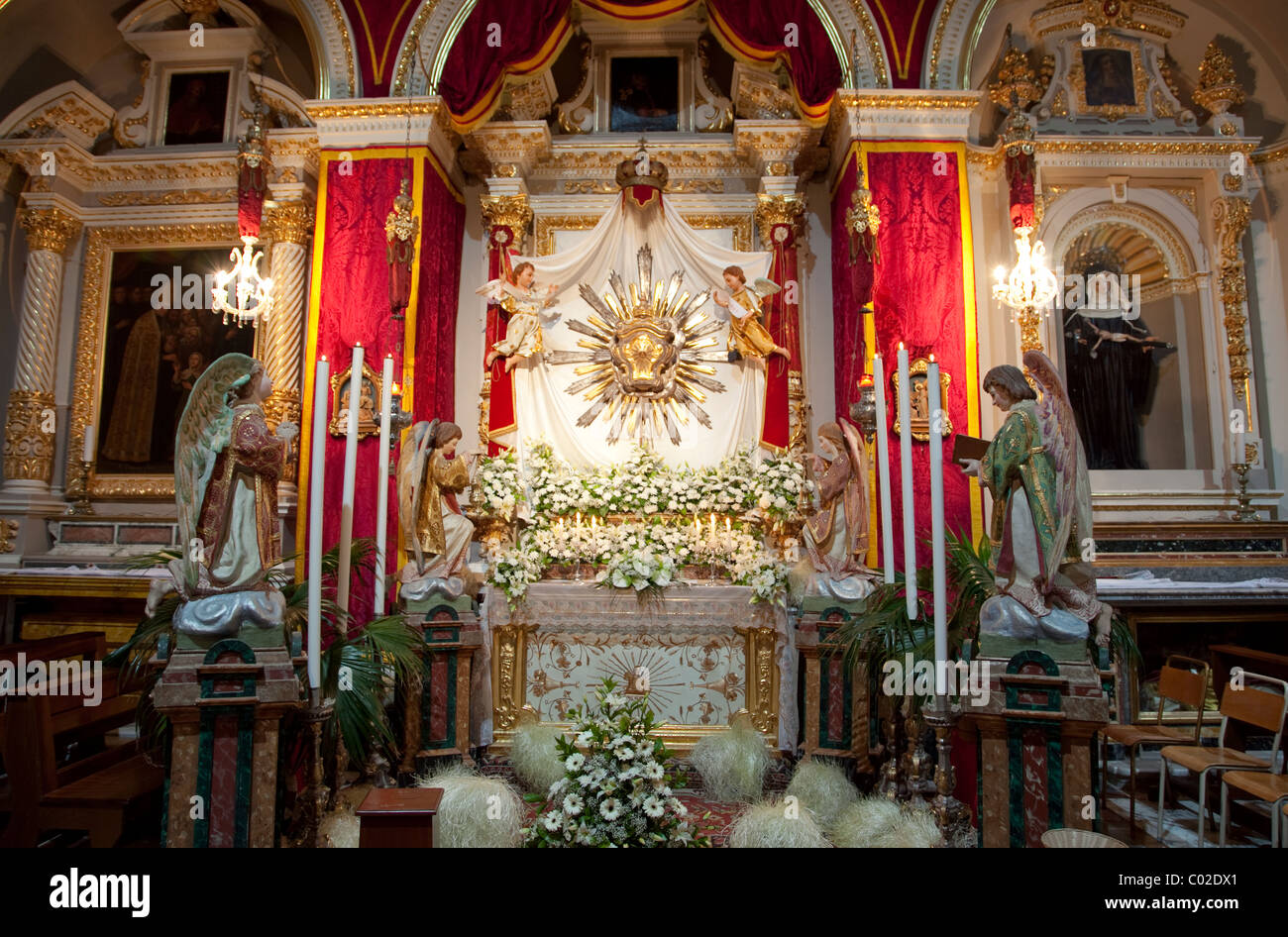 Flowers and other objects make up the sepulchre exhibition that is set up in churches in Malta on eve of Good Friday. Stock Photo
