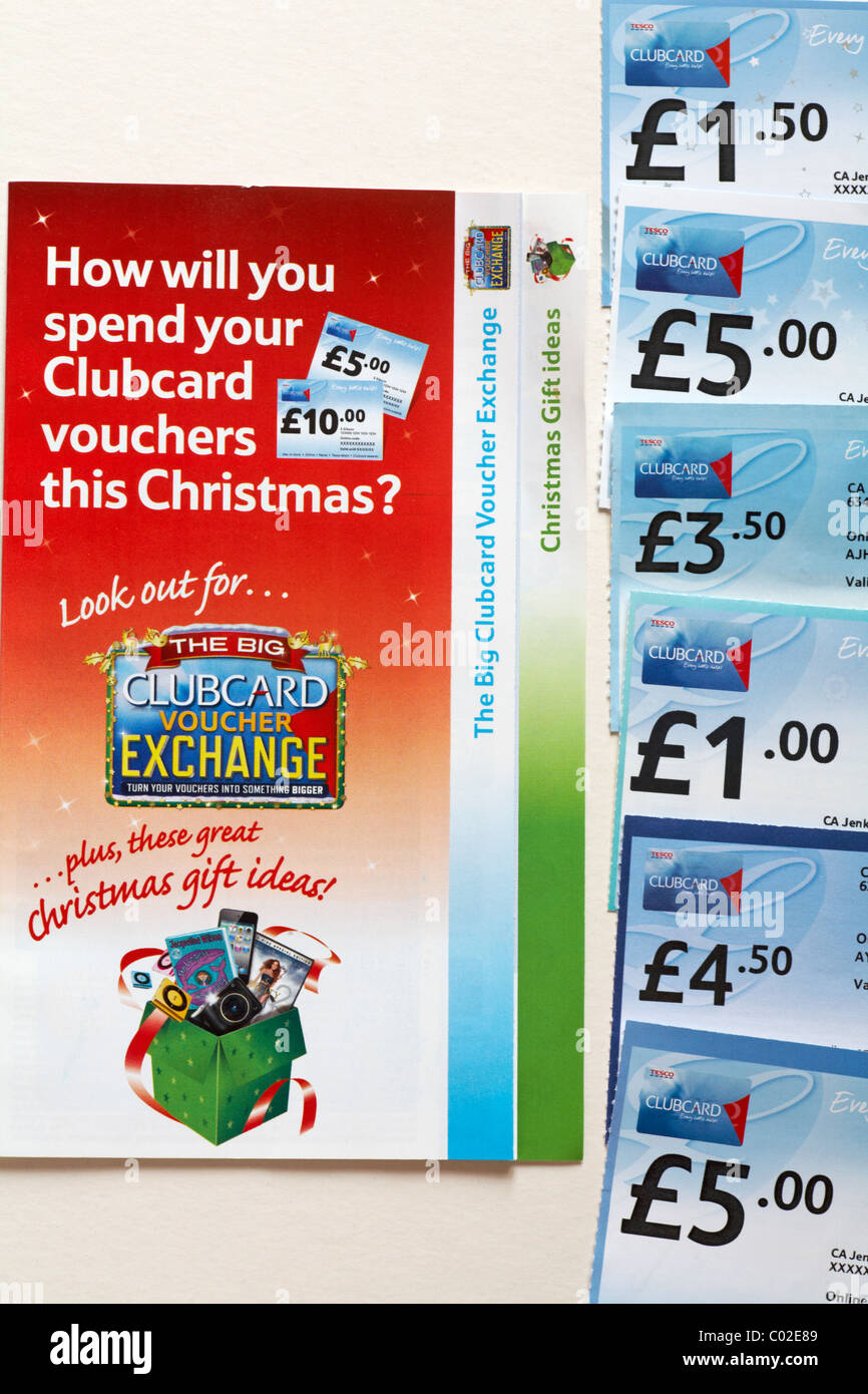 Tesco clubcard vouchers and leaflet on white background Stock Photo
