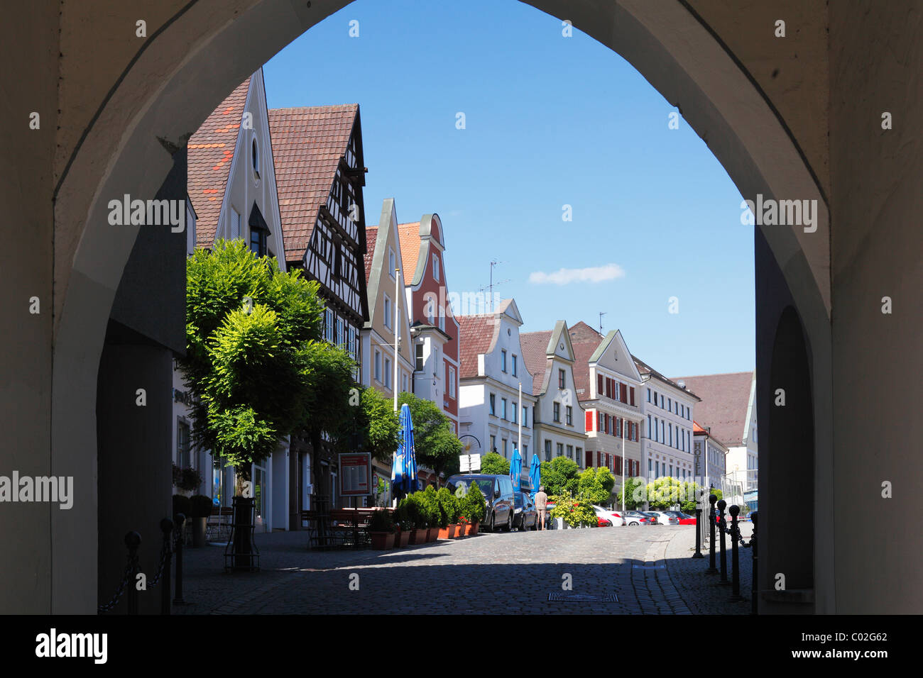 View through the Unteres Tor gate on the marketplace, Guenzburg, Donauried region, Swabia, Bavaria, Germany, Europe Stock Photo