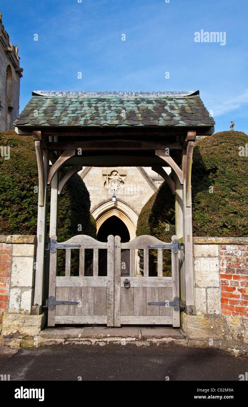 The wooden lych gate of St Katharine's parish church in the village of Holt, Wiltshire, England, UK Stock Photo