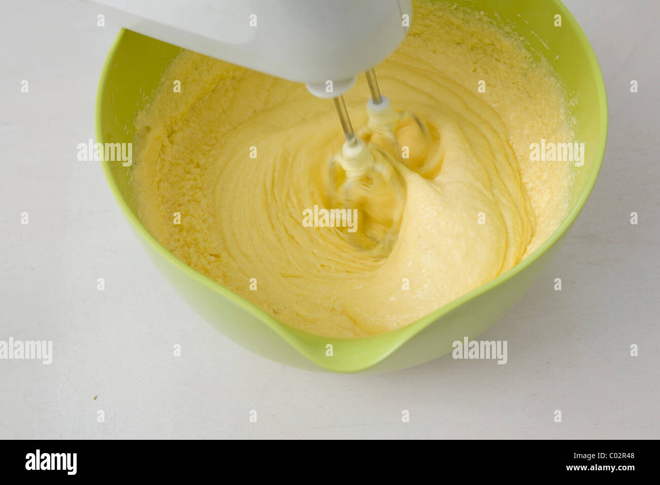 Blender stirring a cake mix Stock Photo Alamy