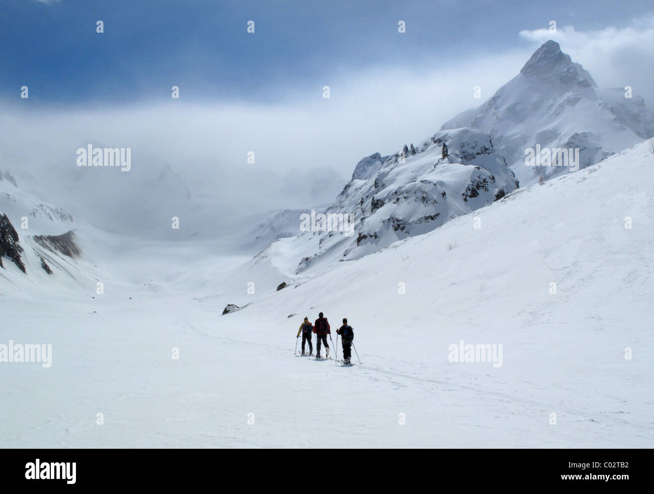 Ski Touring under Mt Chegetkarabashi in the Adyl-Su valley in the Elbrus Region of the Caucasus, Russia Stock Photo