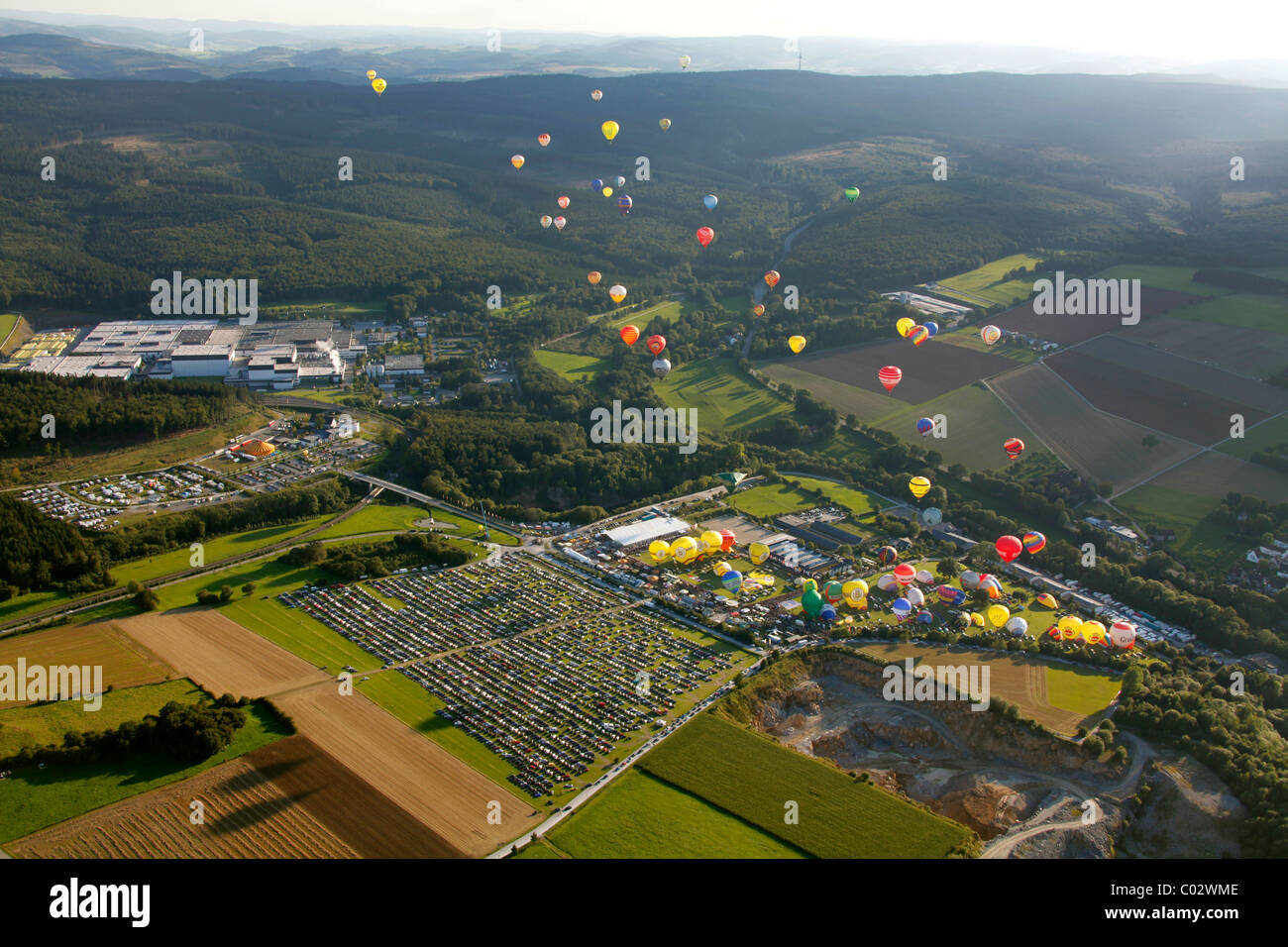 Aerial view, 20th Warsteiner Montgolfiade, hot air balloon festival with nearly 200 hot air balloons ascending into the sky Stock Photo