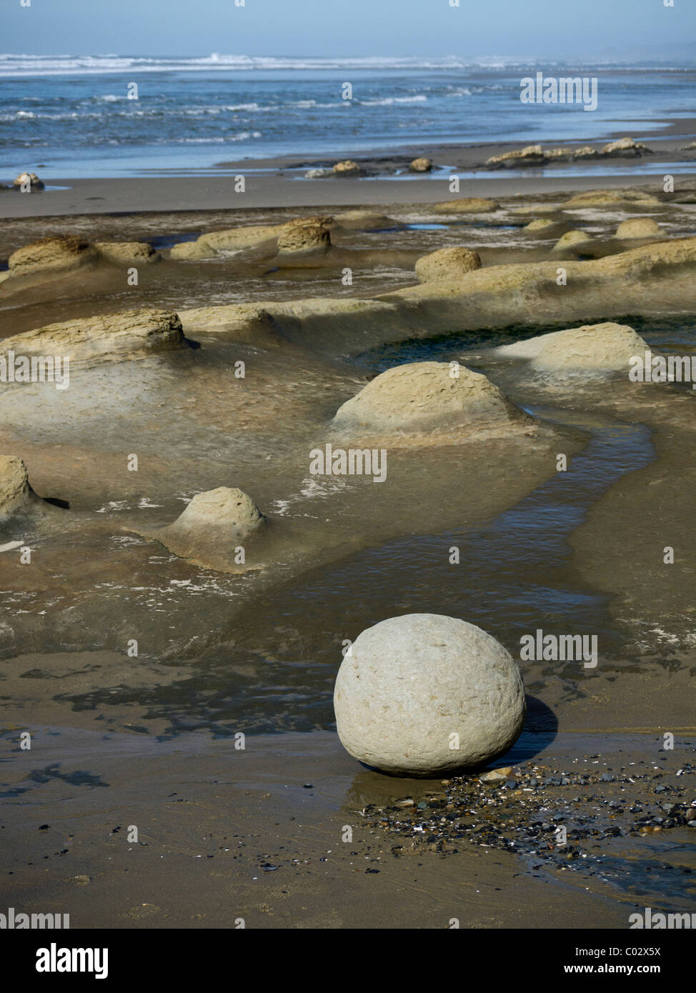 Cannonball concretions on an Oregon coast beach Stock Photo