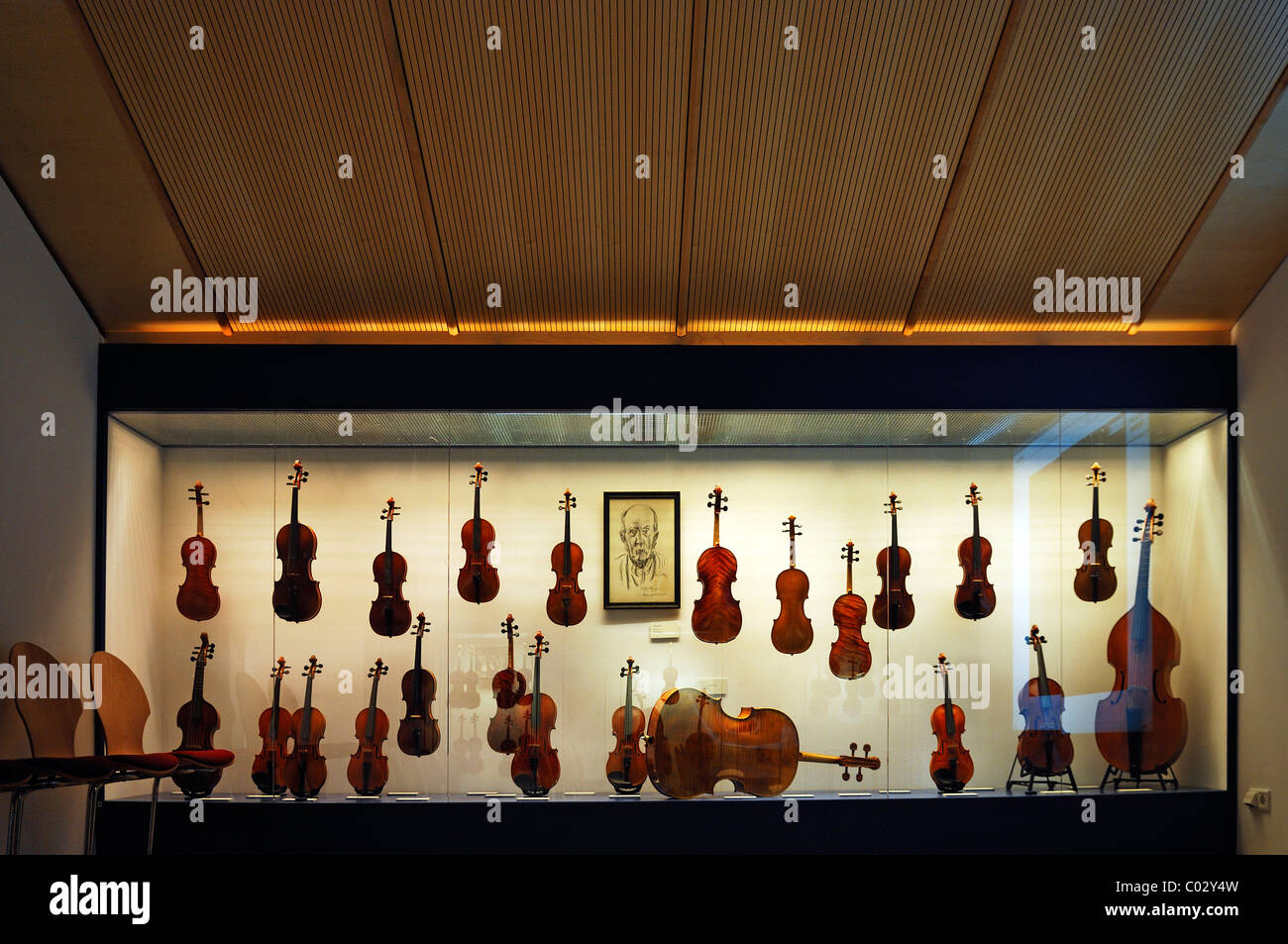 Exhibition room, display case with string instruments, Geigenbaumuseum violin museum, Ballenhausgasse 3, Mittenwald Stock Photo
