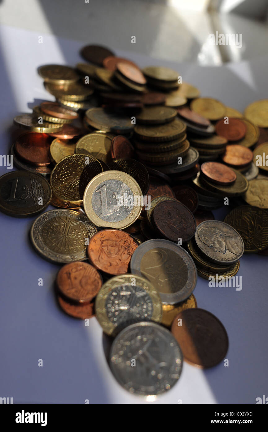 Old foreign currency coins including the Euro Stock Photo Alamy