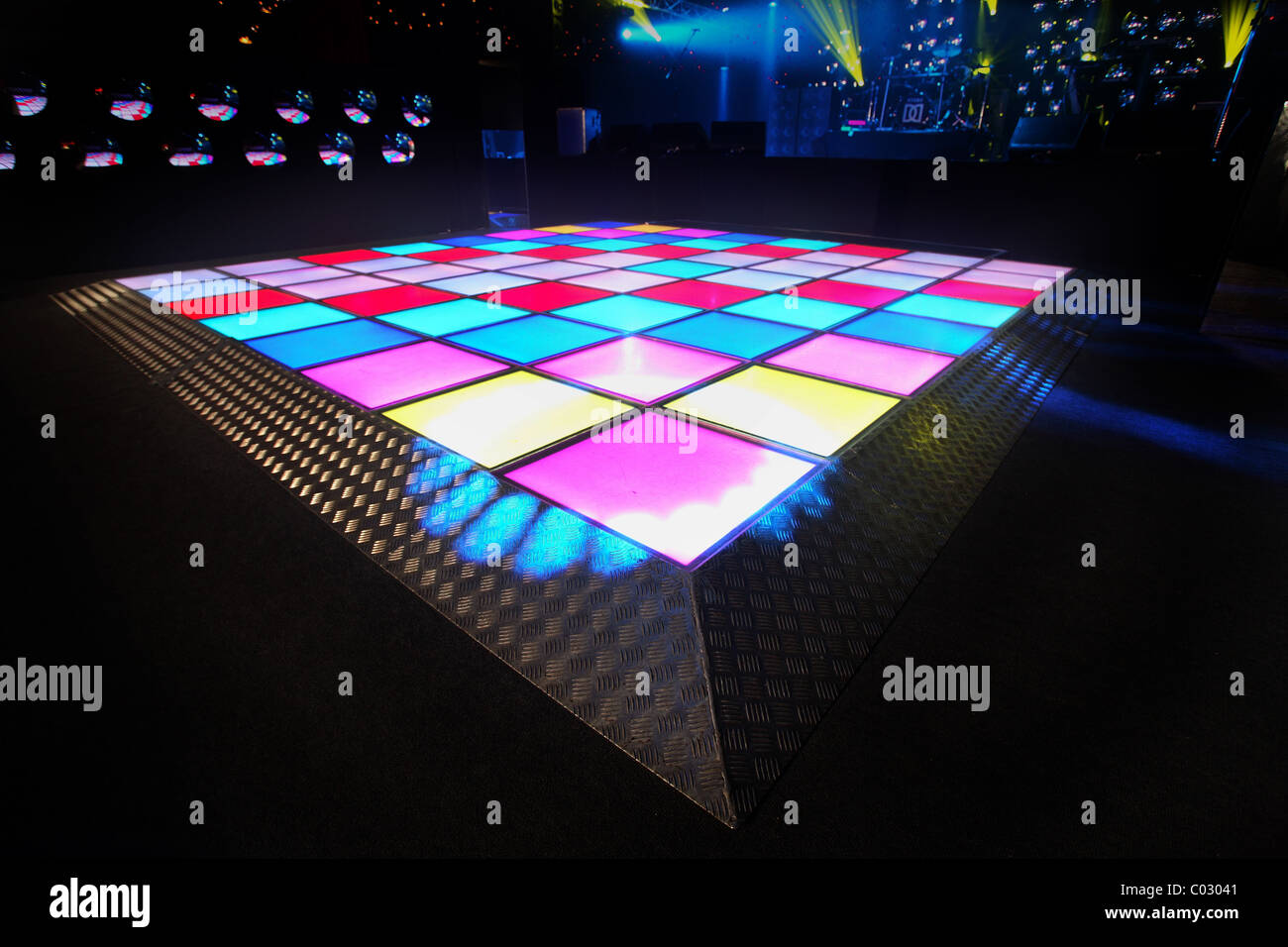 an empty illuminated disco dance floor.  Christmas party Stock Photo