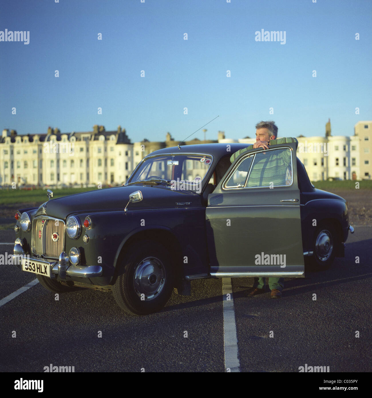 1960s Rover 110 saloon car and owner, Littlehampton, West Sussex, UK Stock Photo
