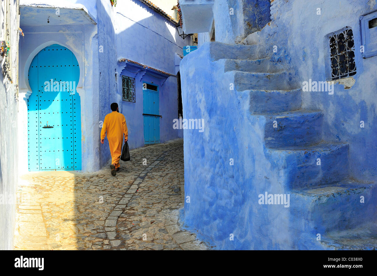 Narrow streets and staircase in the medina of Chefchaouen, Riff ...