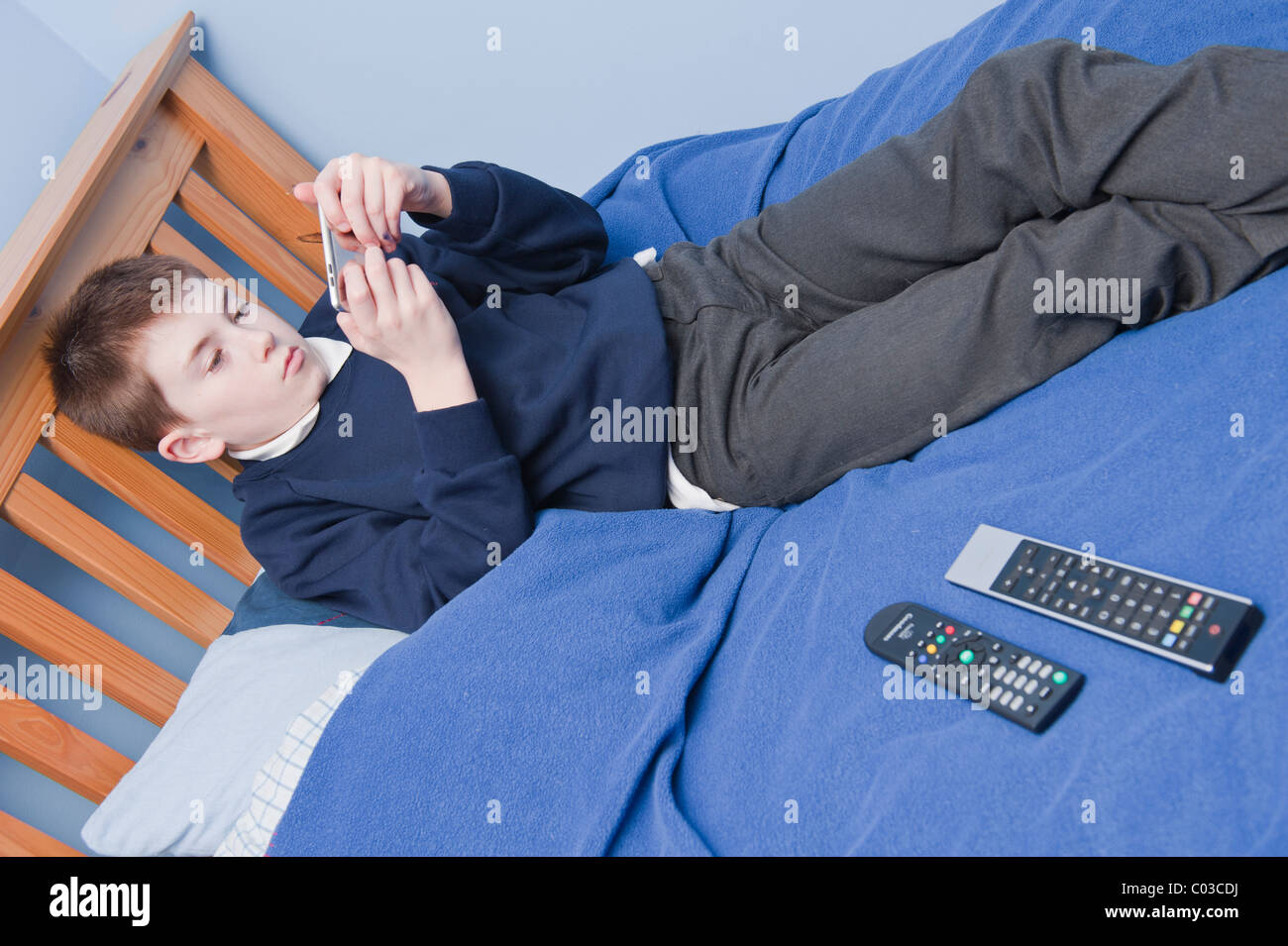 A MODEL RELEASED picture of an eleven year old boy playing with his