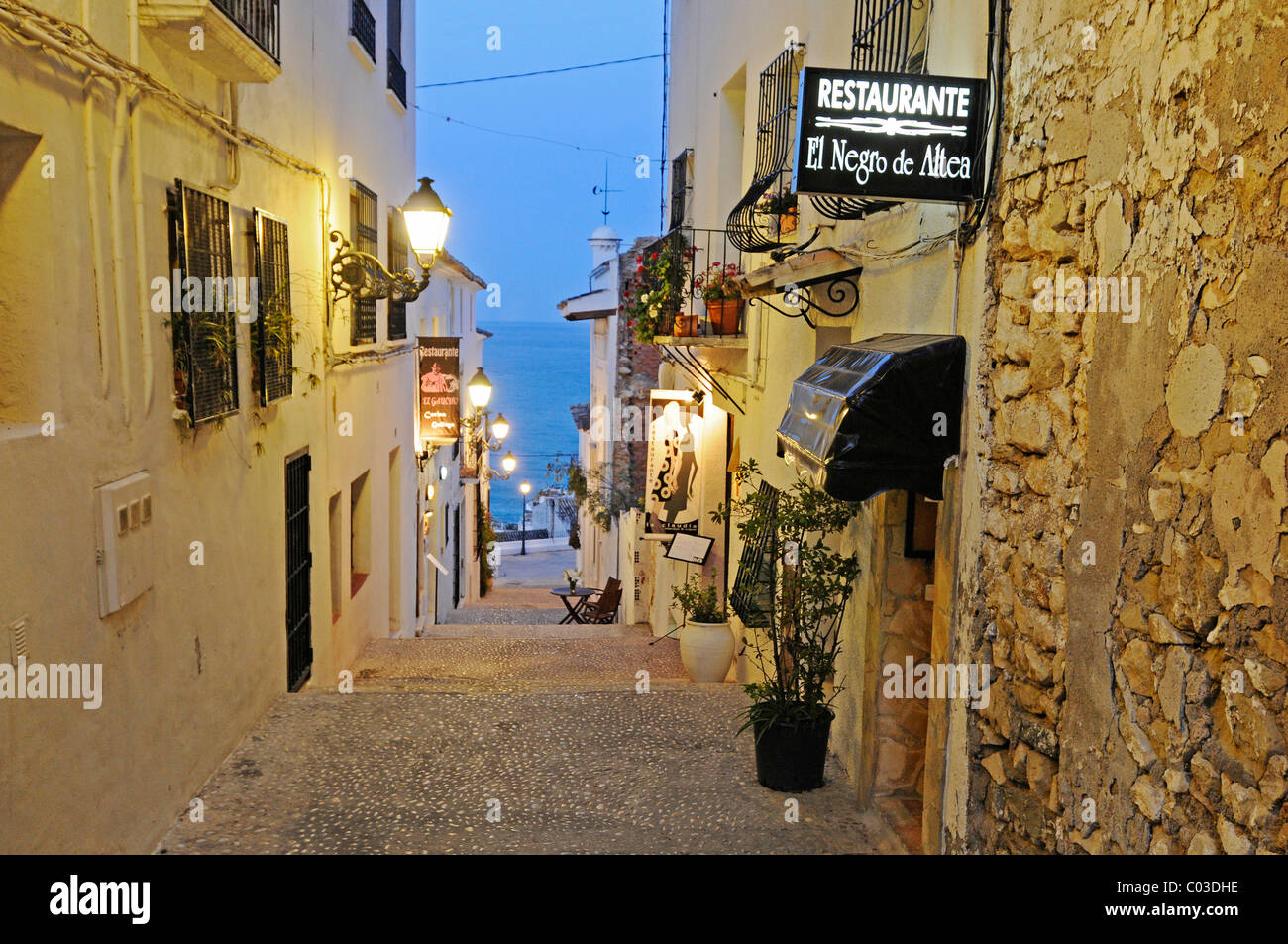 Small alleyway, lighting, sea, restaurant, historic town centre in