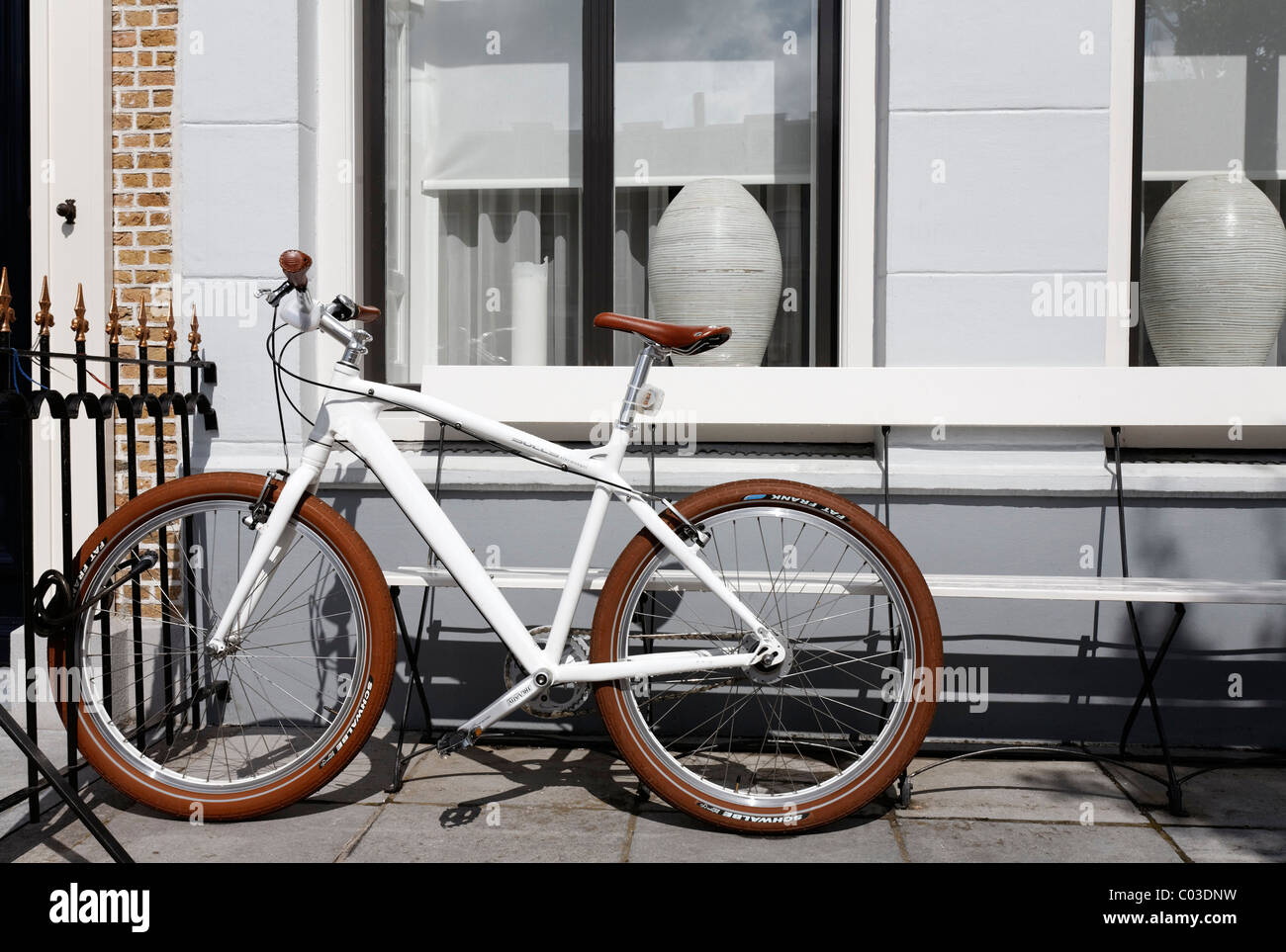 Bike parked in front of house hi res stock photography and images Alamy