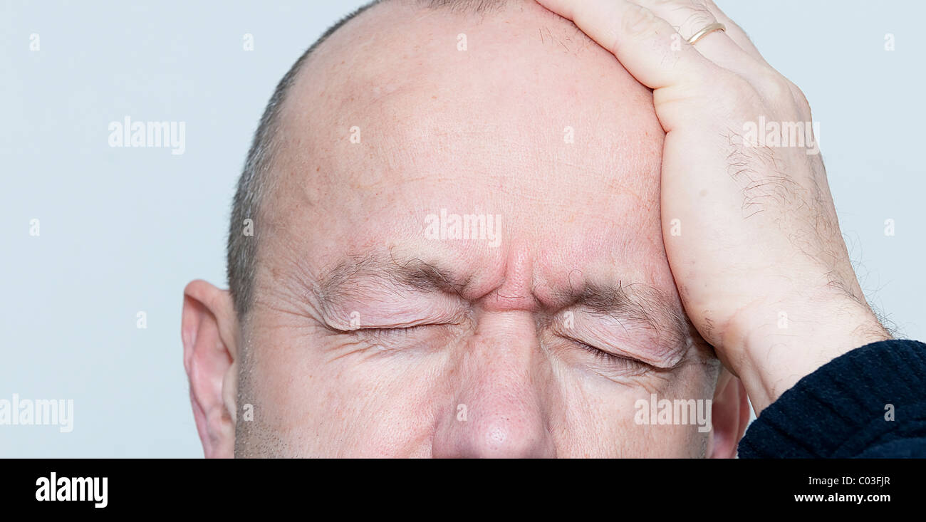 A man with head ache Stock Photo