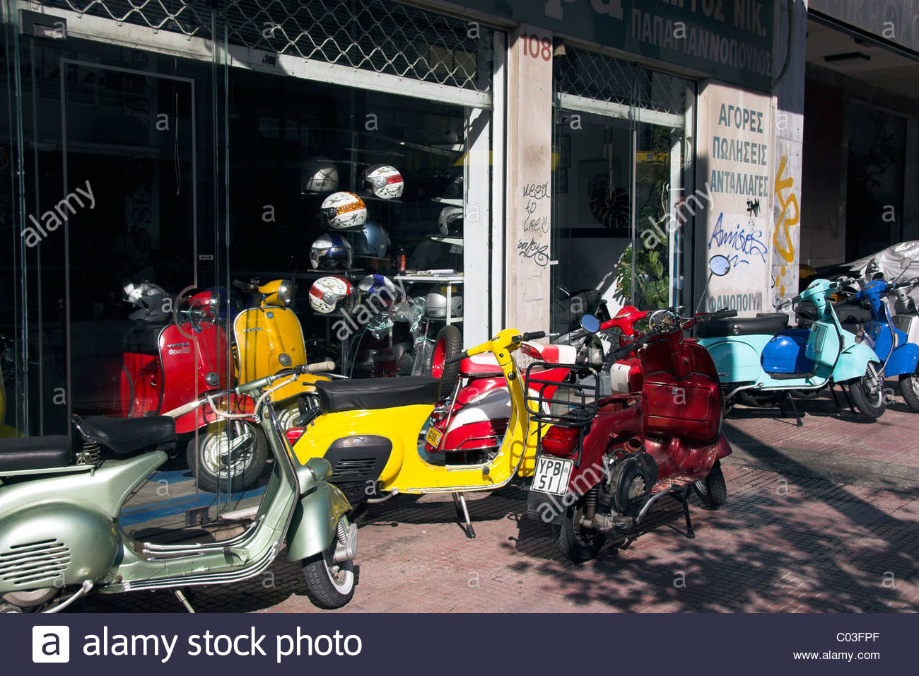 Scooters outside a scooter shop in Athens, Greece Stock Photo: 34498983