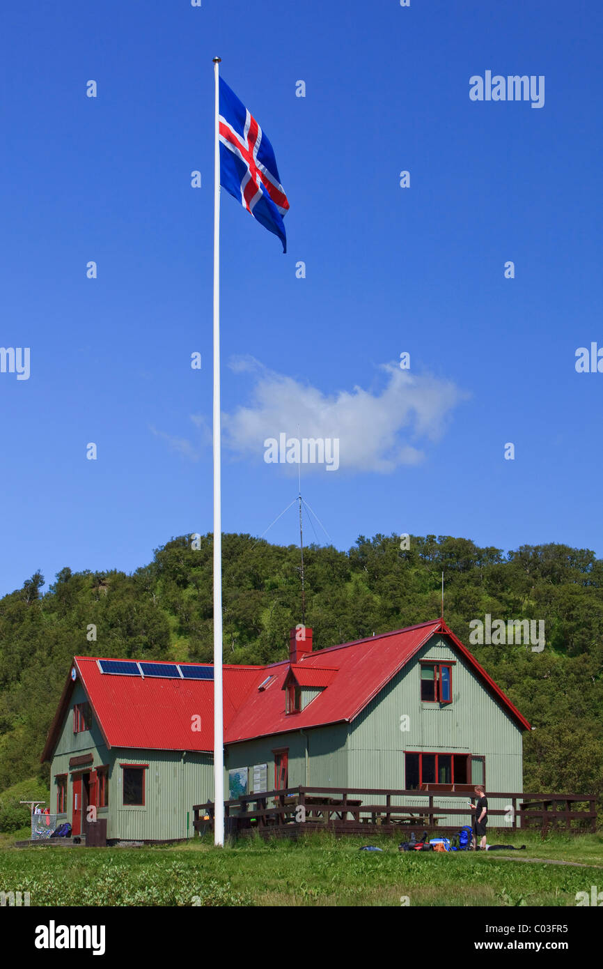 Hikers' cabin with the Icelandic flag, Borsmoerk, Iceland, Europe Stock Photo