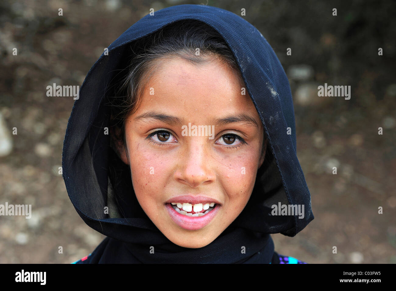 Portrait, Fatima girl, ca. 9, wearing a headscarf, Middle Atlas