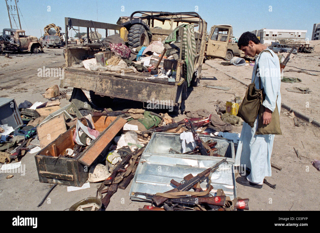 Destroyed vehicles on the Highway 80 known as the the Highway of Death in Kuwait in the Gulf War. Stock Photo