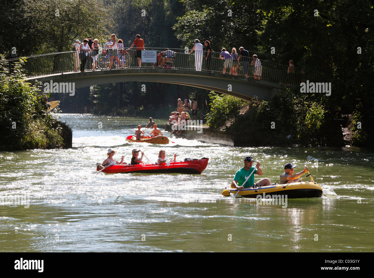Inflatable boats on the Isar Flosskanal canal, Thalkirchen, Munich ...