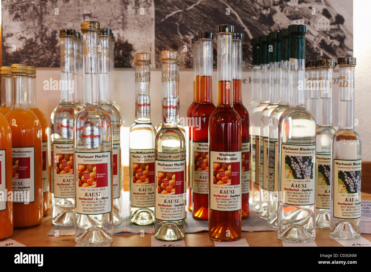 Bottles of schnapps and liquor from apricots and grapes, Wachau, Waldviertel, Lower Austria, Austria, Europe Stock Photo