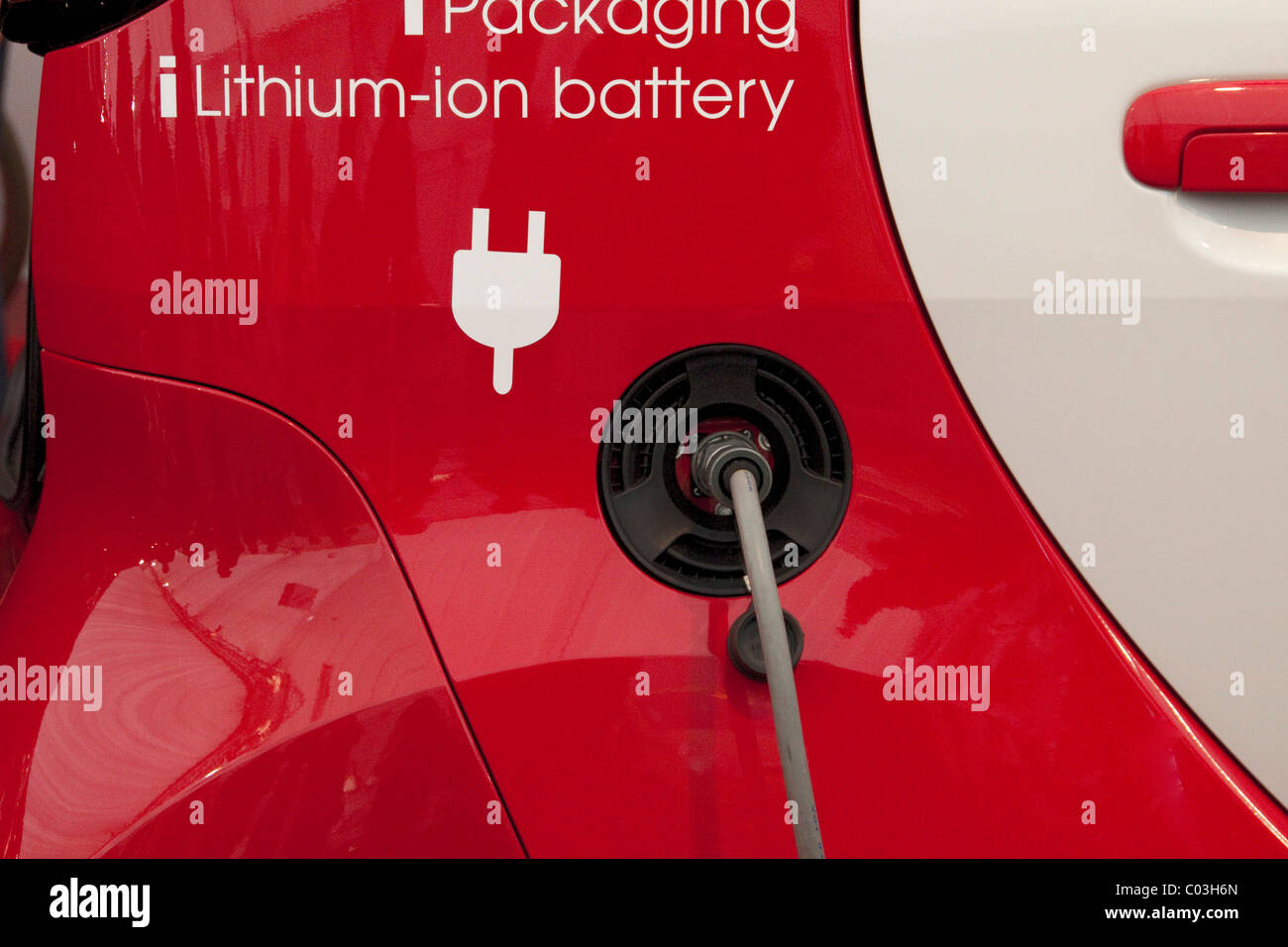 Electric car getting charged hires stock photography and images Alamy