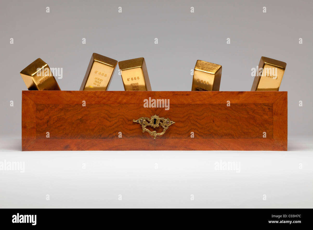 Gold bars being stored in a drawer Stock Photo
