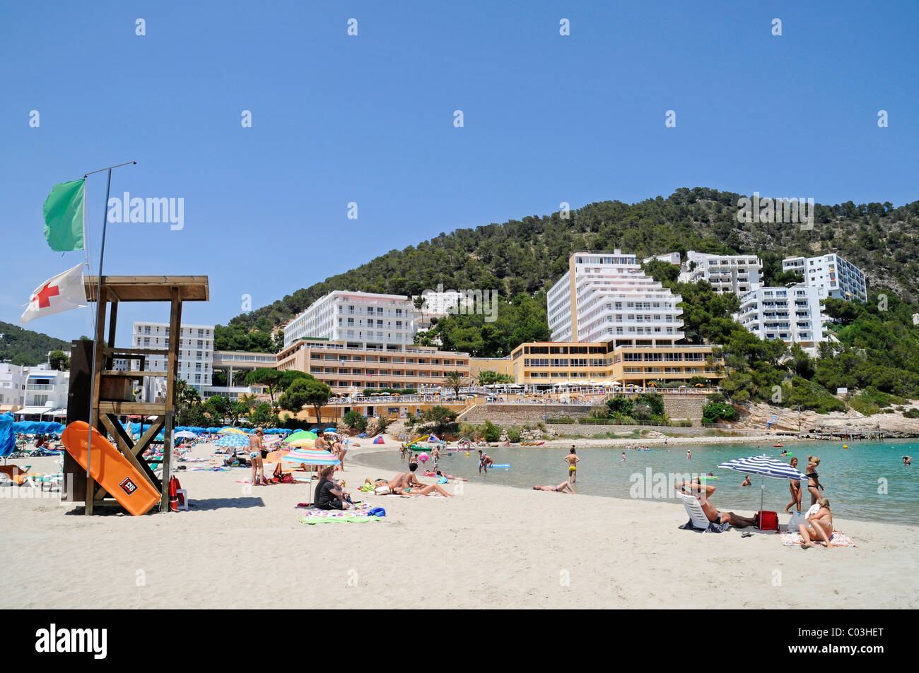 Cala Llonga, beach, watch tower, hotels, Santa Eulalia des Riu, Ibiza, Pityuses, Balearic Islands, Spain, Europe Stock Photo