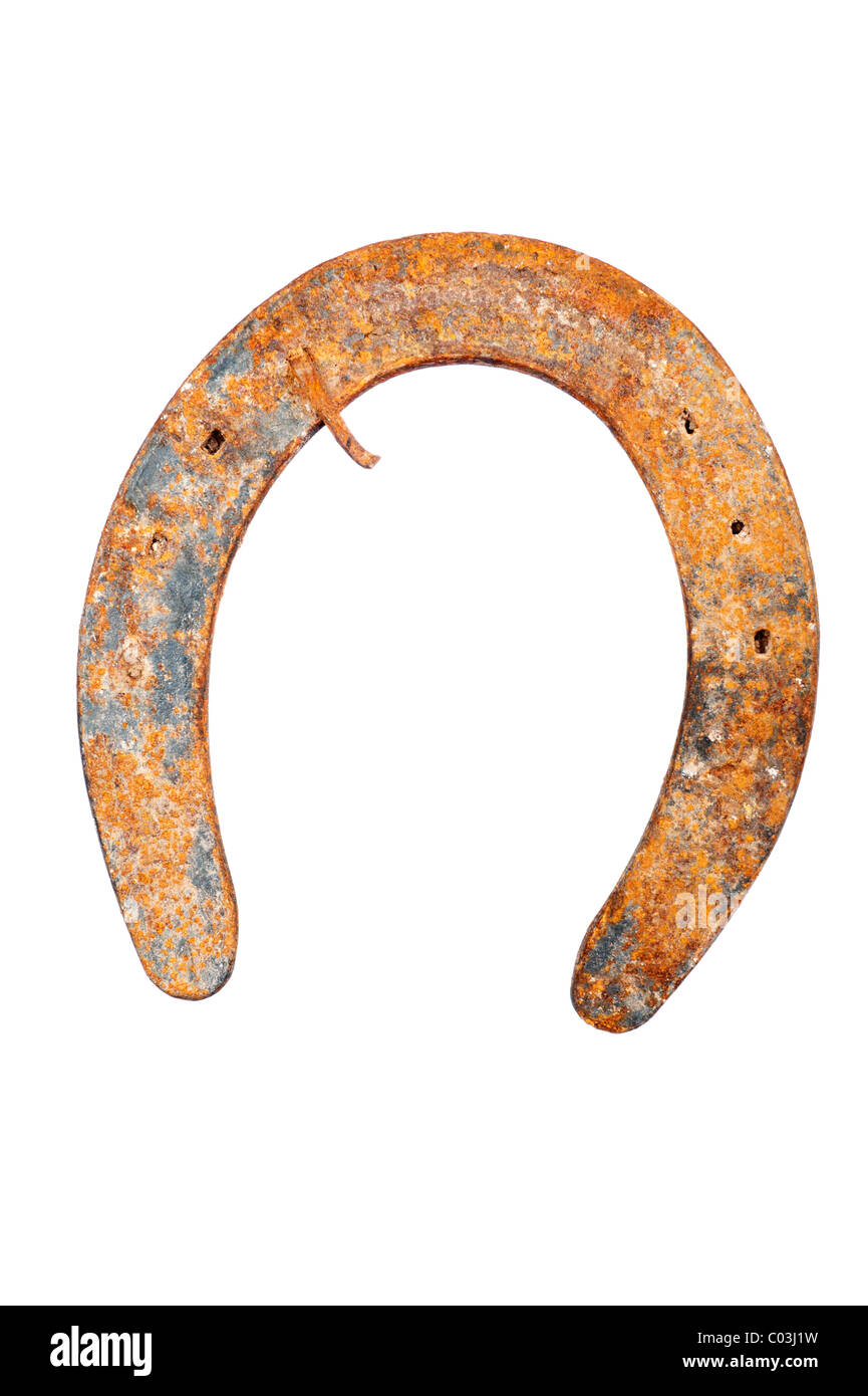 An old rusty horseshoe isolated on a white background. Stock Photo