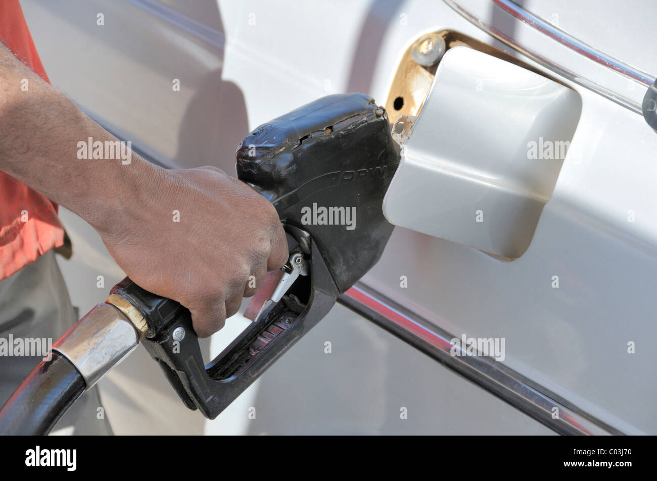Gas station attendant, gas station in Morocco, Africa Stock Photo Alamy