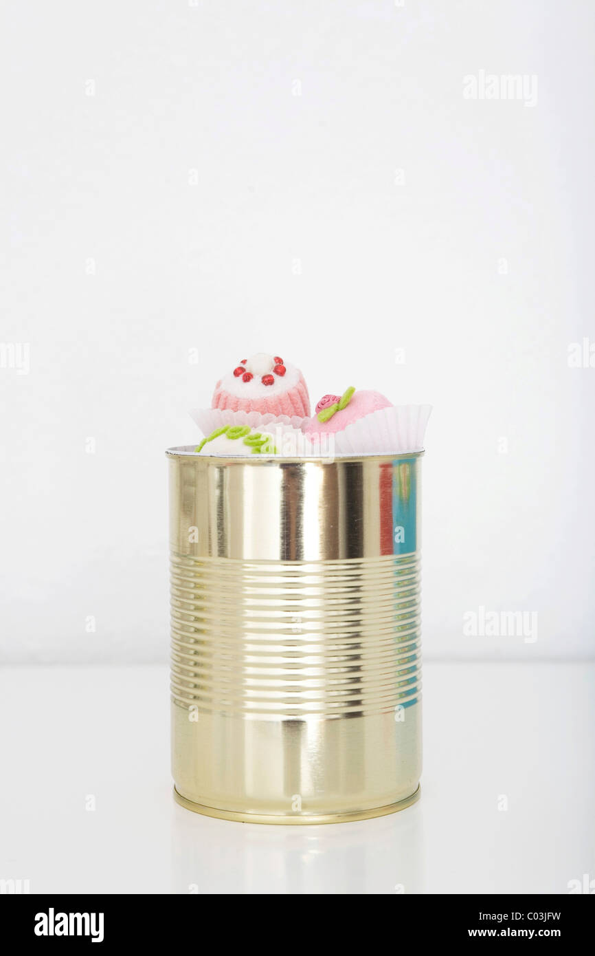 Chocolates in a tin can Stock Photo Alamy
