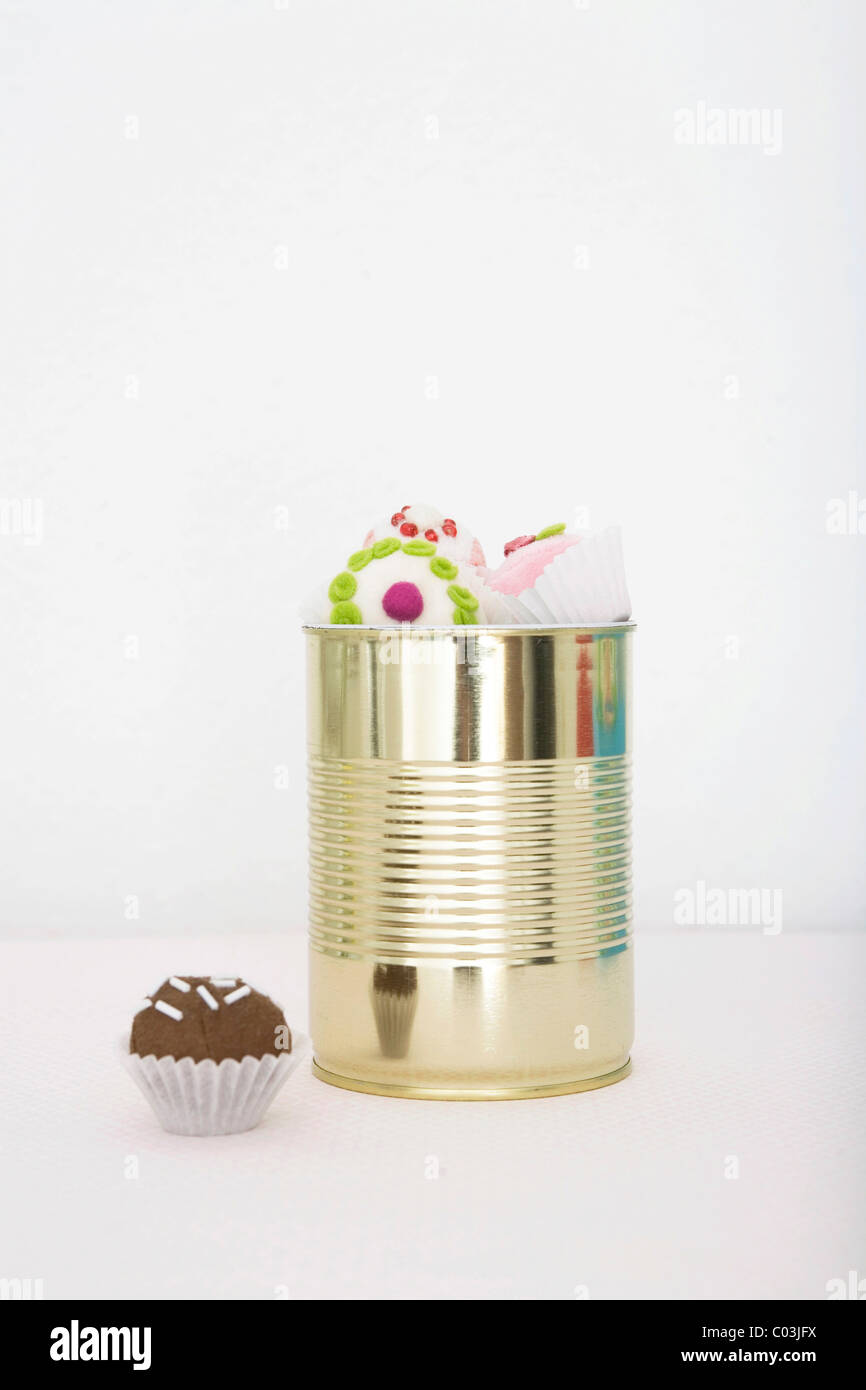 Chocolates in a tin can Stock Photo Alamy