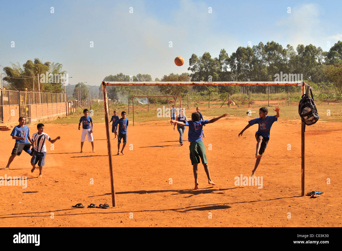 Boys playing football, Brasilia, Distrito Federal, Brazilian Federal District, Brazil, South America Stock Photo