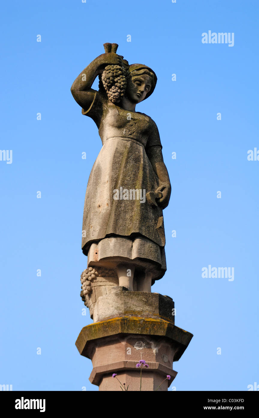 Fountain statue, young woman with grapes, Place de la Sinne, Kientzheim, Alsace, France, Europe Stock Photo