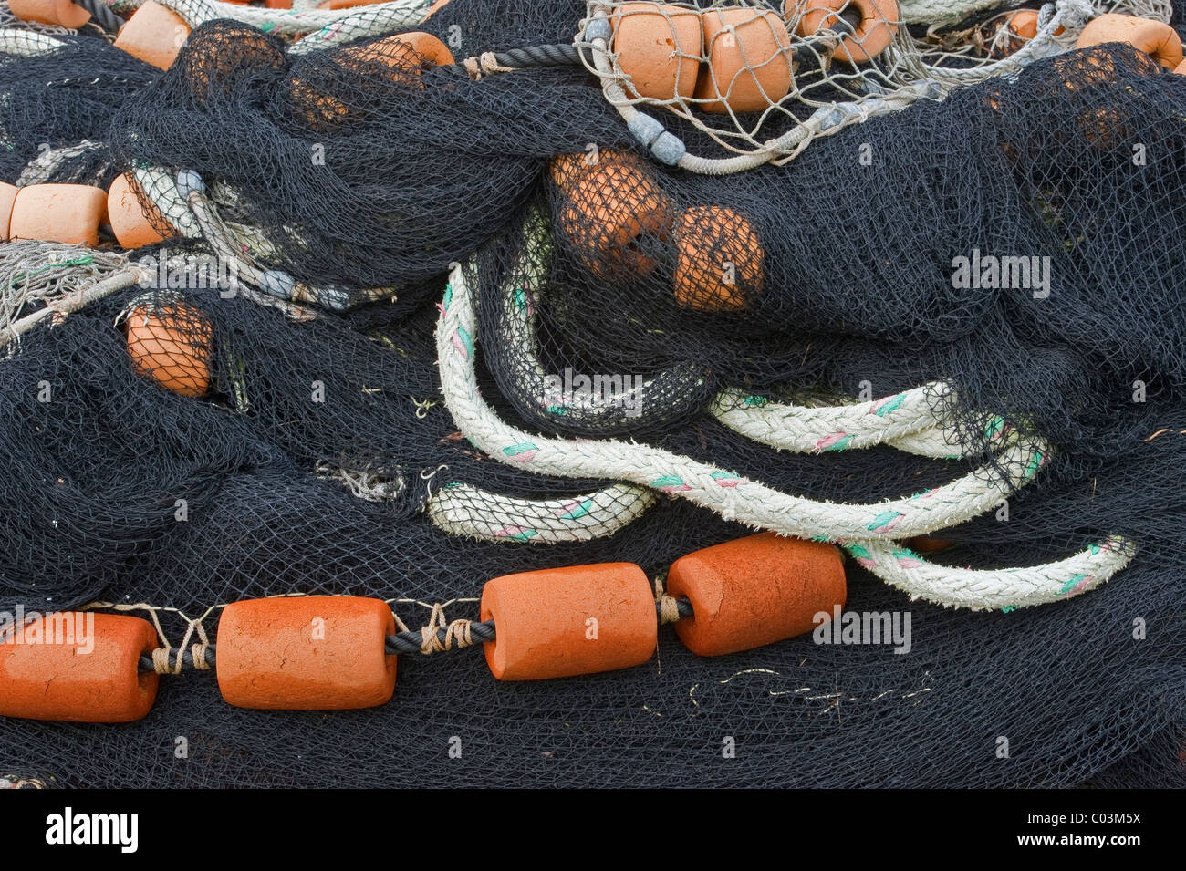 Herring and Salmon fishing seines stacked up at the Silver Bay Seafood