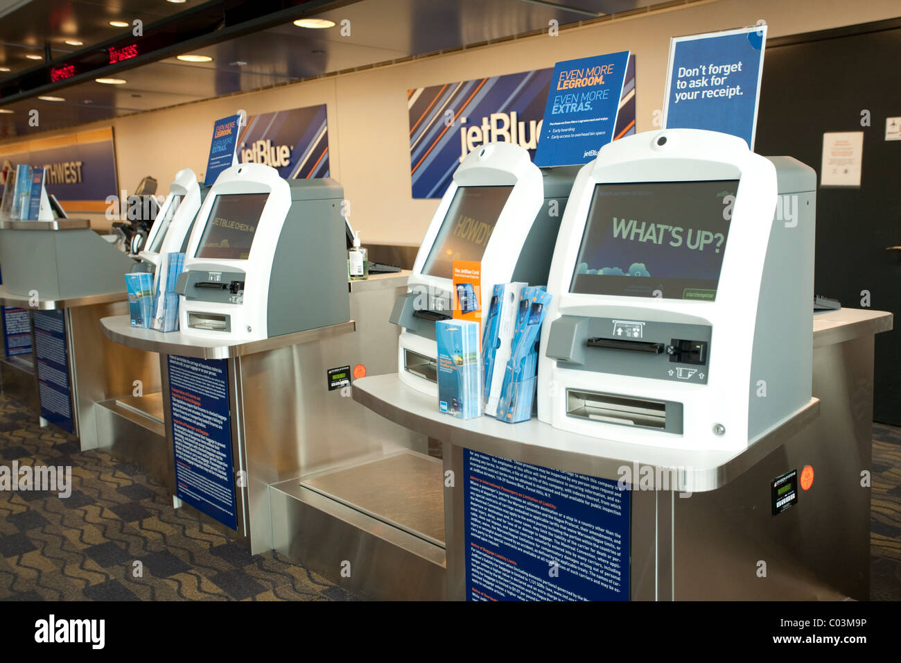 Jet Blue ticketing area kiosks are vacant during snow emergency at Bradley International Airport  in Hartford, Connecticut. Stock Photo