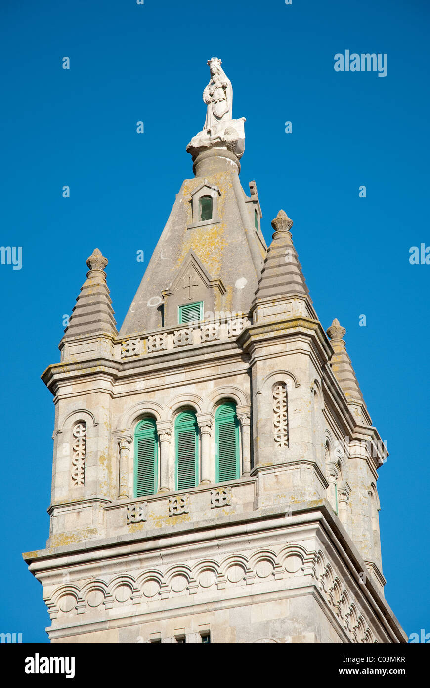 Portuguese church tower detail view agains blue clear sky Stock Photo