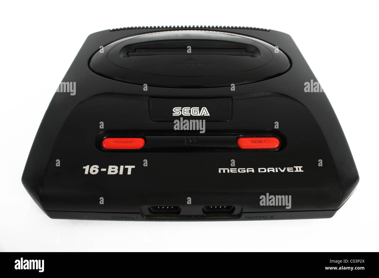An old retro gaming video games console system called the Sega Mega Drive 16 Bit edition on a white background Stock Photo