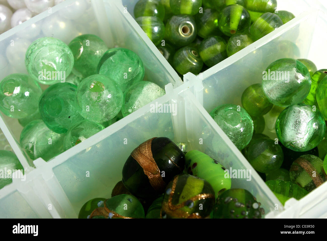Beautiful glass beads in a beadwork box for jewelery making as a craft, work or hobby. Stock Photo