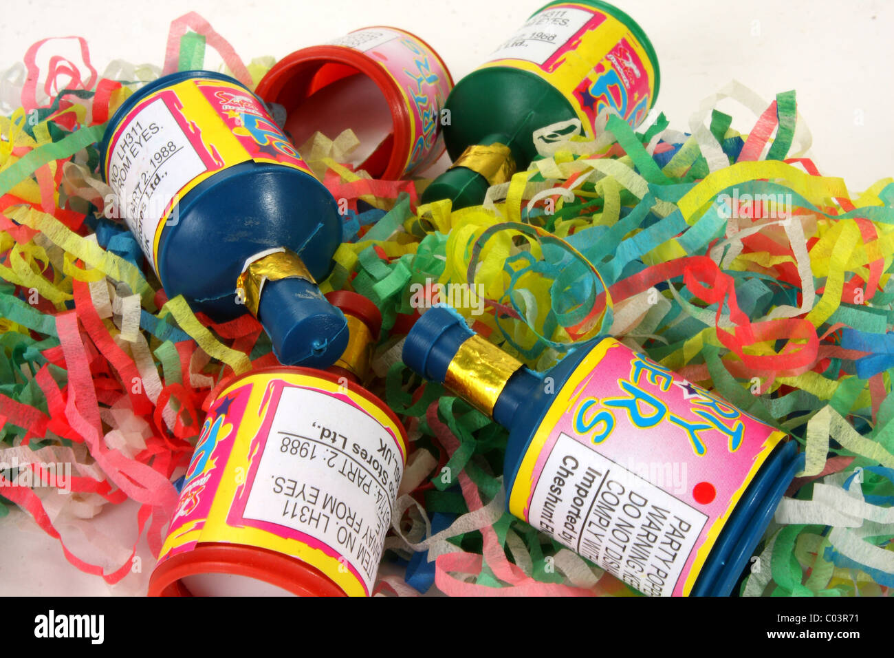 Party poppers with confetti to celebrate different occasions such as birthdays, engagement and Christmas. Stock Photo
