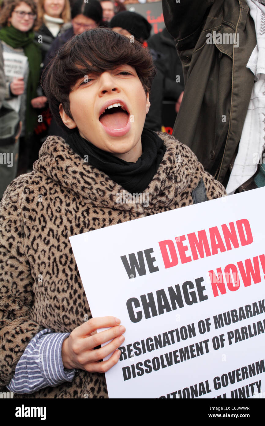 Woman in crowd. In solidarity, in defiance: global day of action for Egypt. Trafalgar Square, London Stock Photo