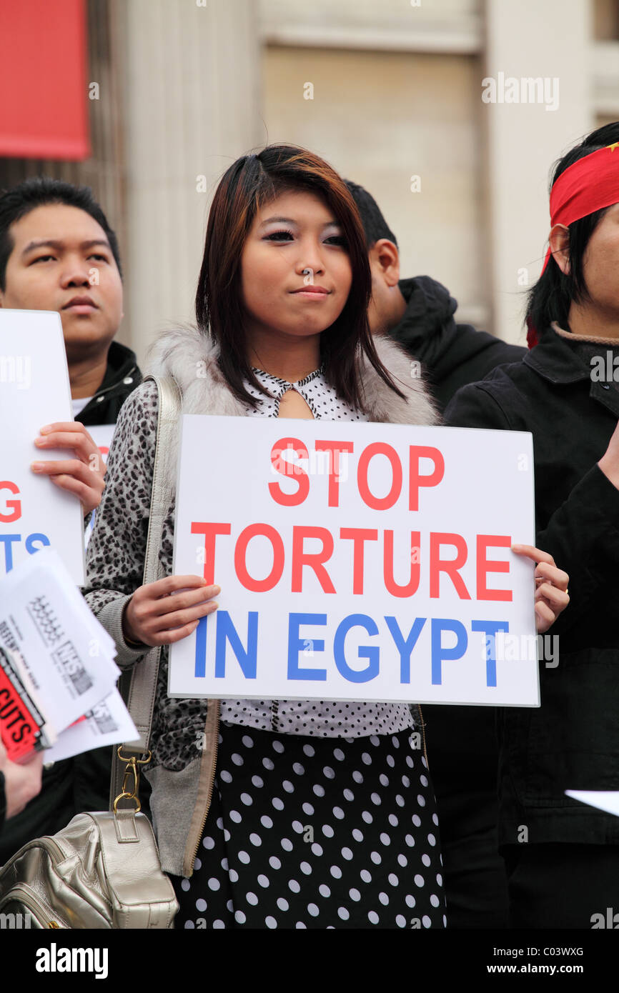 Woman in crowd. In solidarity, in defiance: global day of action for Egypt. Trafalgar Square, London Stock Photo