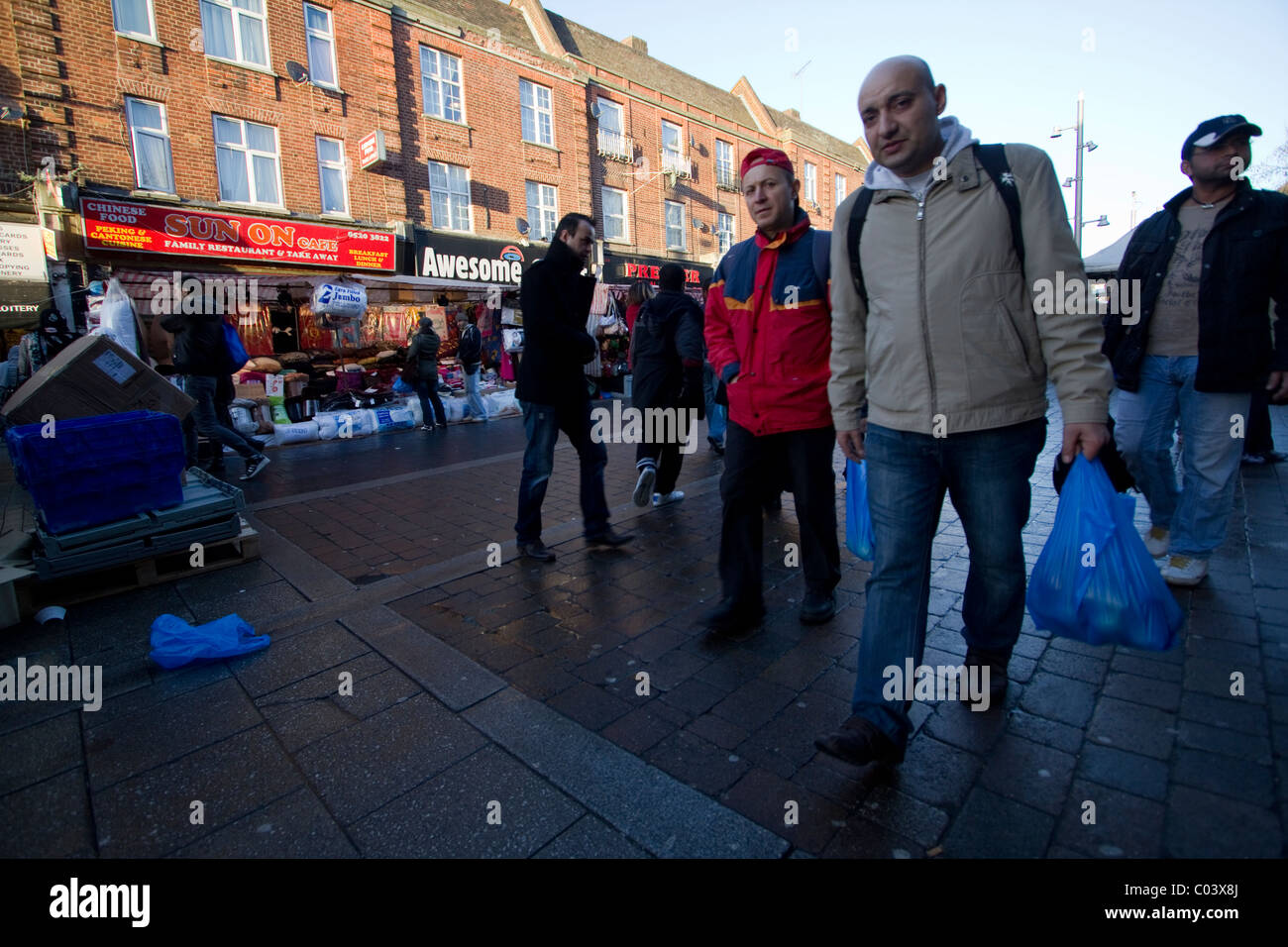 shoppers, shopping, amongst market stalls Walthamstow high street, Walthamstow Stock Photo