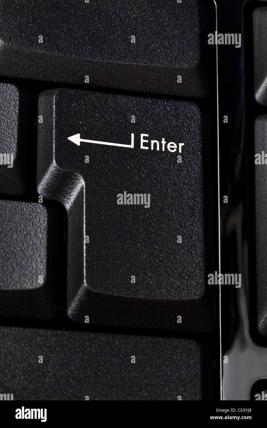 Closeup Enter button on black keyboard Stock Photo
