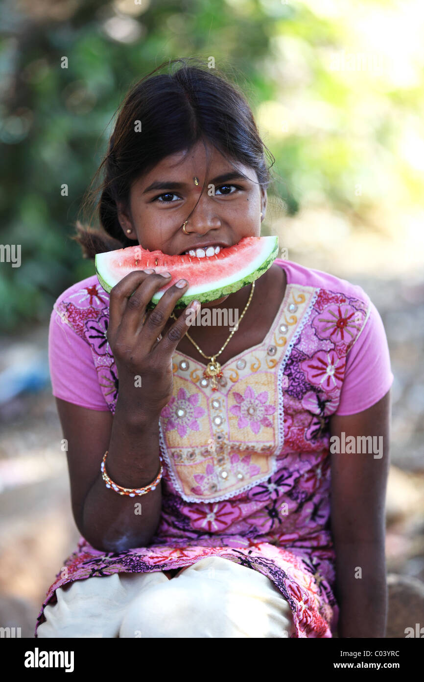 Indian girl eating a slice watermelon Andhra Pradesh South India Stock ...
