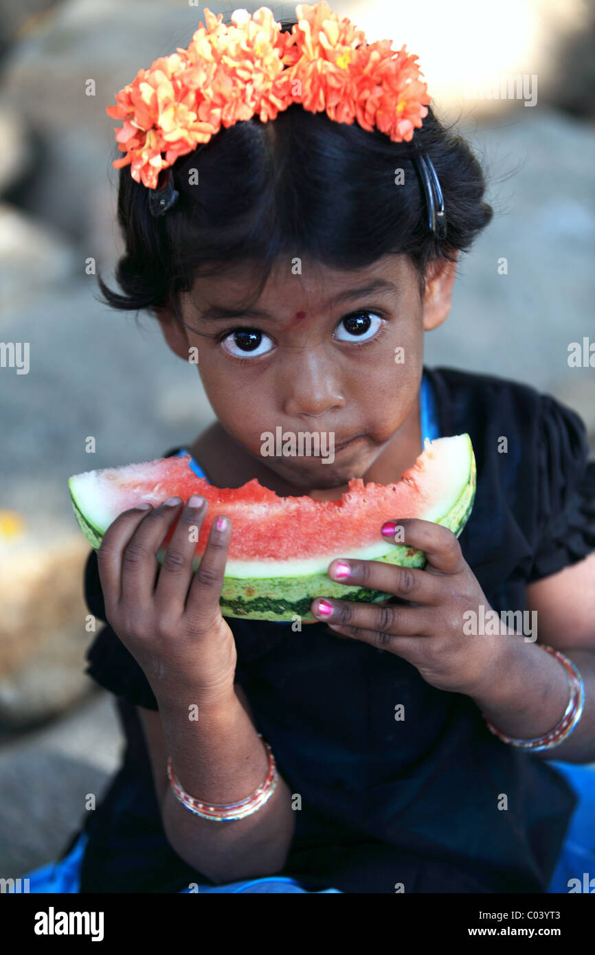 Indian girl eating a slice watermelon Andhra Pradesh South India Stock ...