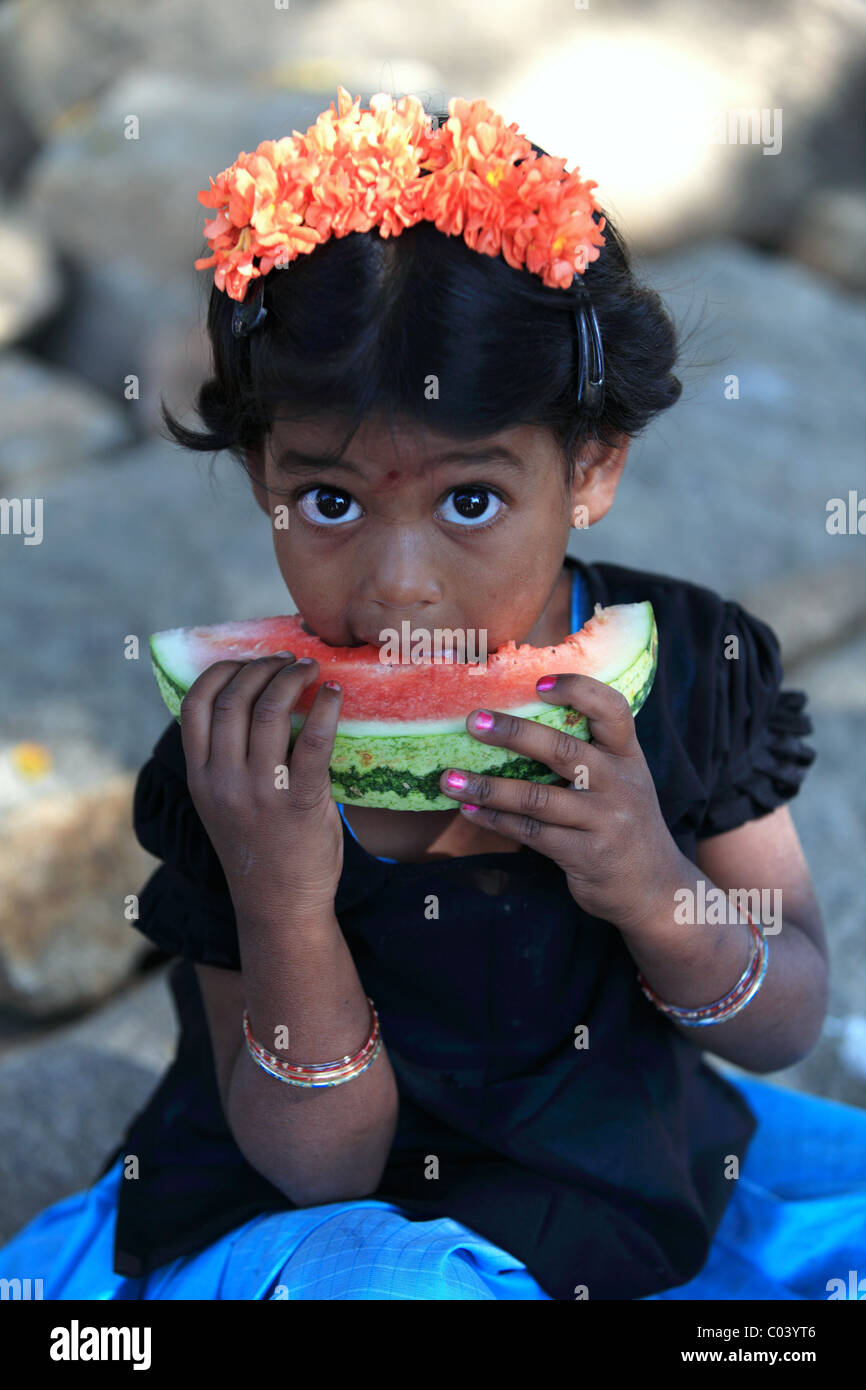 Indian girl eating a slice watermelon Andhra Pradesh South India Stock ...