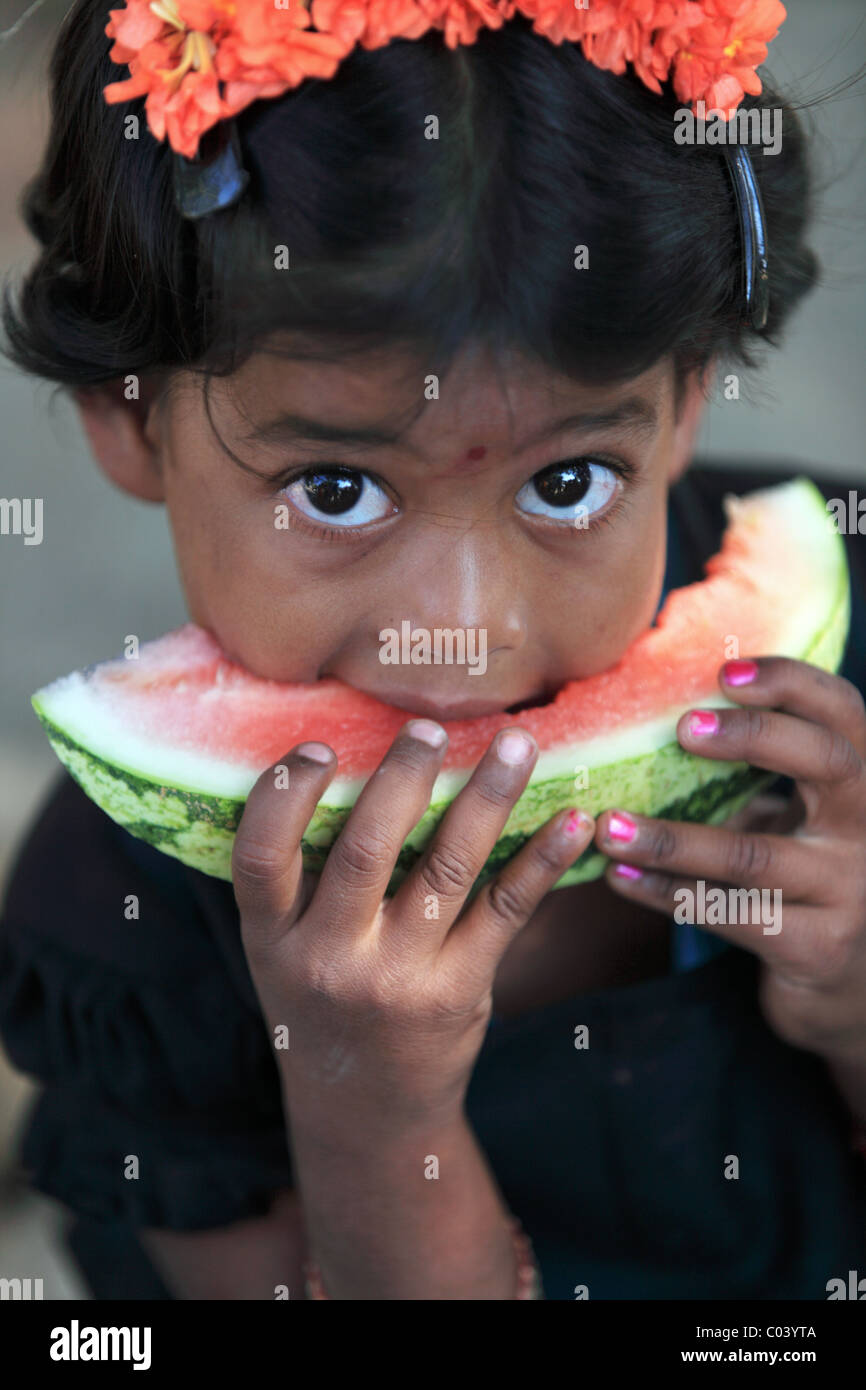 Indian girl eating a slice watermelon Andhra Pradesh South India Stock ...