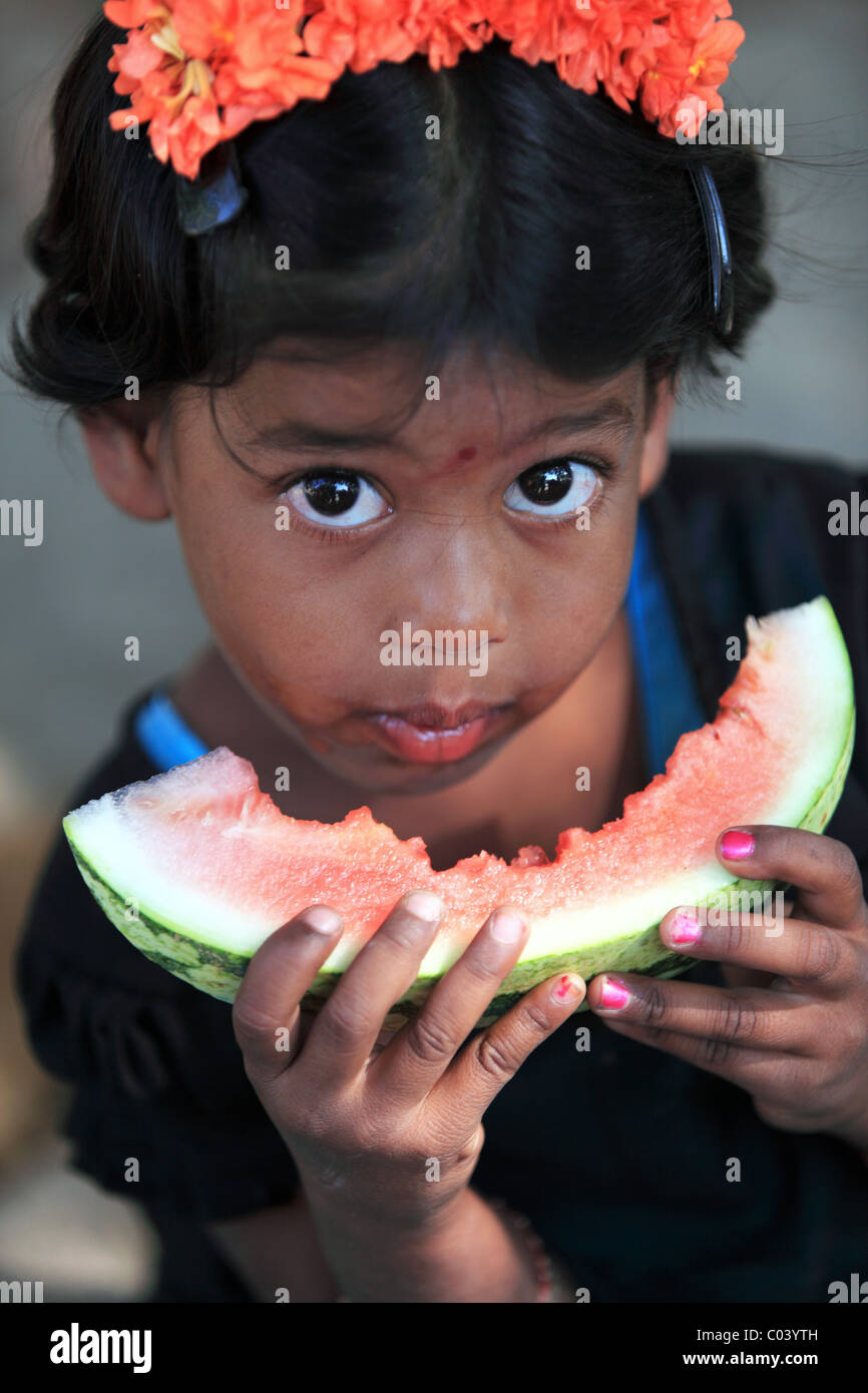 Indian girl eating a slice watermelon Andhra Pradesh South India Stock ...