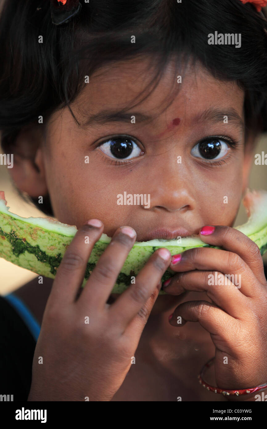 Indian girl eating a slice watermelon Andhra Pradesh South India Stock ...