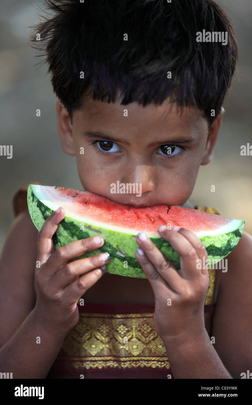 Indian girl eating a slice watermelon Andhra Pradesh South India Stock ...