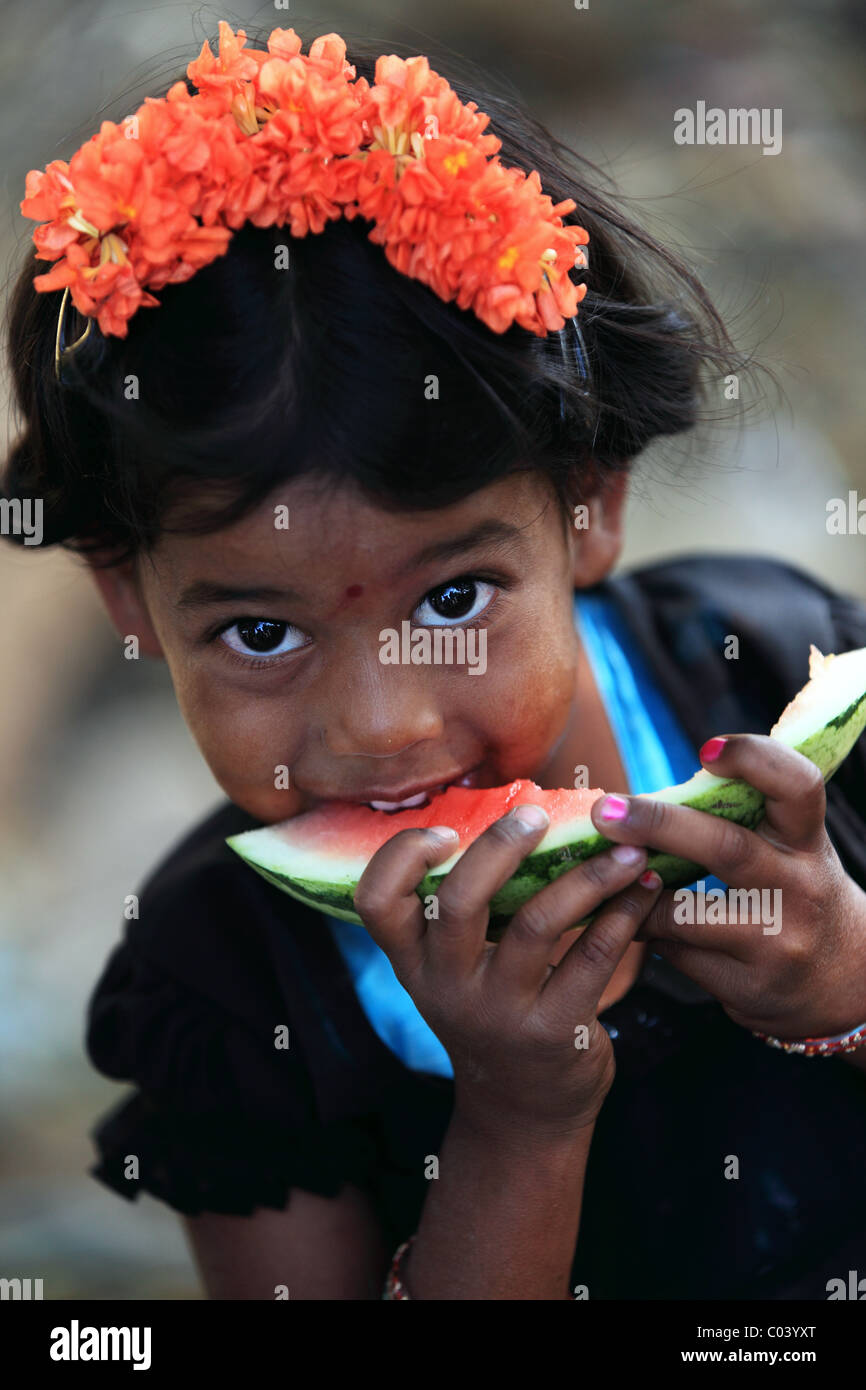 Indian girl eating a slice watermelon Andhra Pradesh South India Stock ...